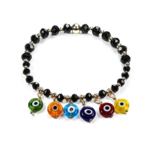 Pulsera con cristales negros y ojitos turcos colgantes